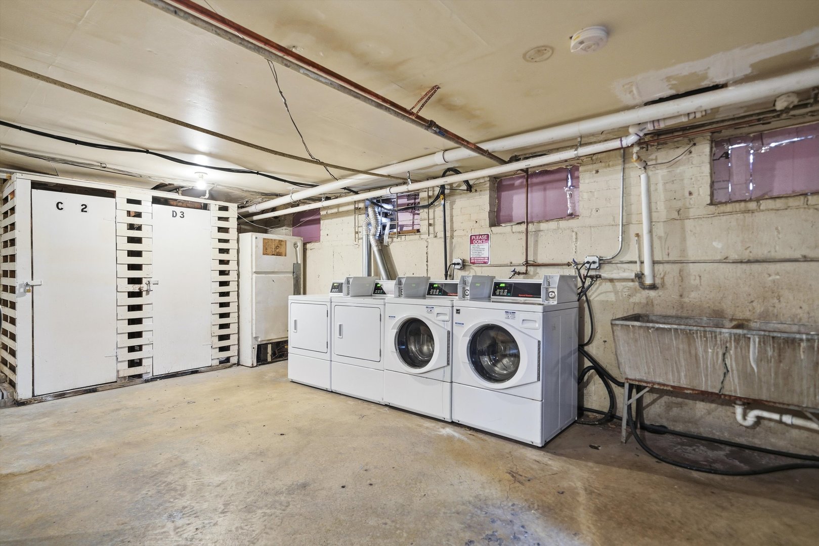 2153 East 87th Street Chicago, IL 60617 - Photo 8 of 9 a utility room with dryer and washer