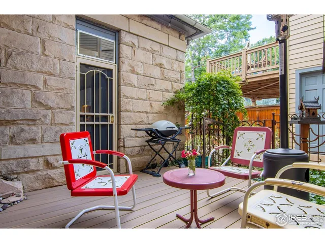 a view of a chairs and tables in patio