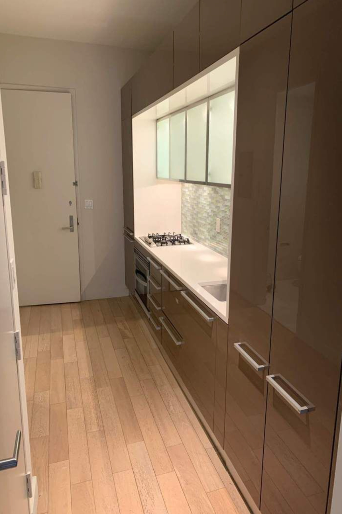 75 Wall Street, Unit 36J Manhattan, NY 10005 - Photo 3 of 7 a view of an empty room with a window