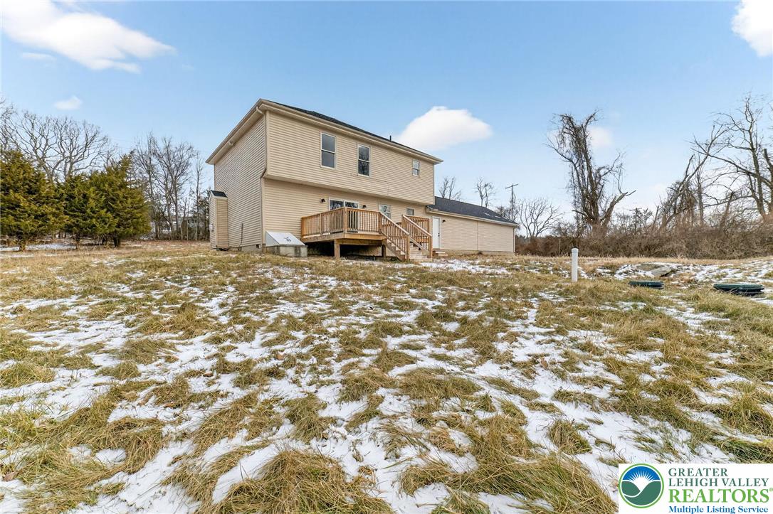 5693 Neola Road Stroudsburg, PA 18360 - Photo 28 of 30 a white house covered with tall trees