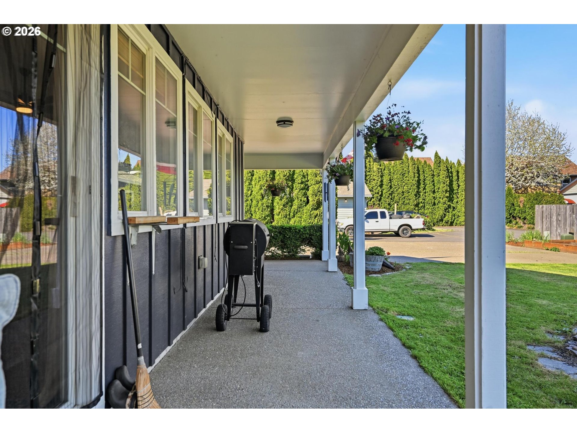 624 North Pershing Street Mount Angel, OR 97362 - Photo 4 of 47 a view of a porch with chairs and backyard