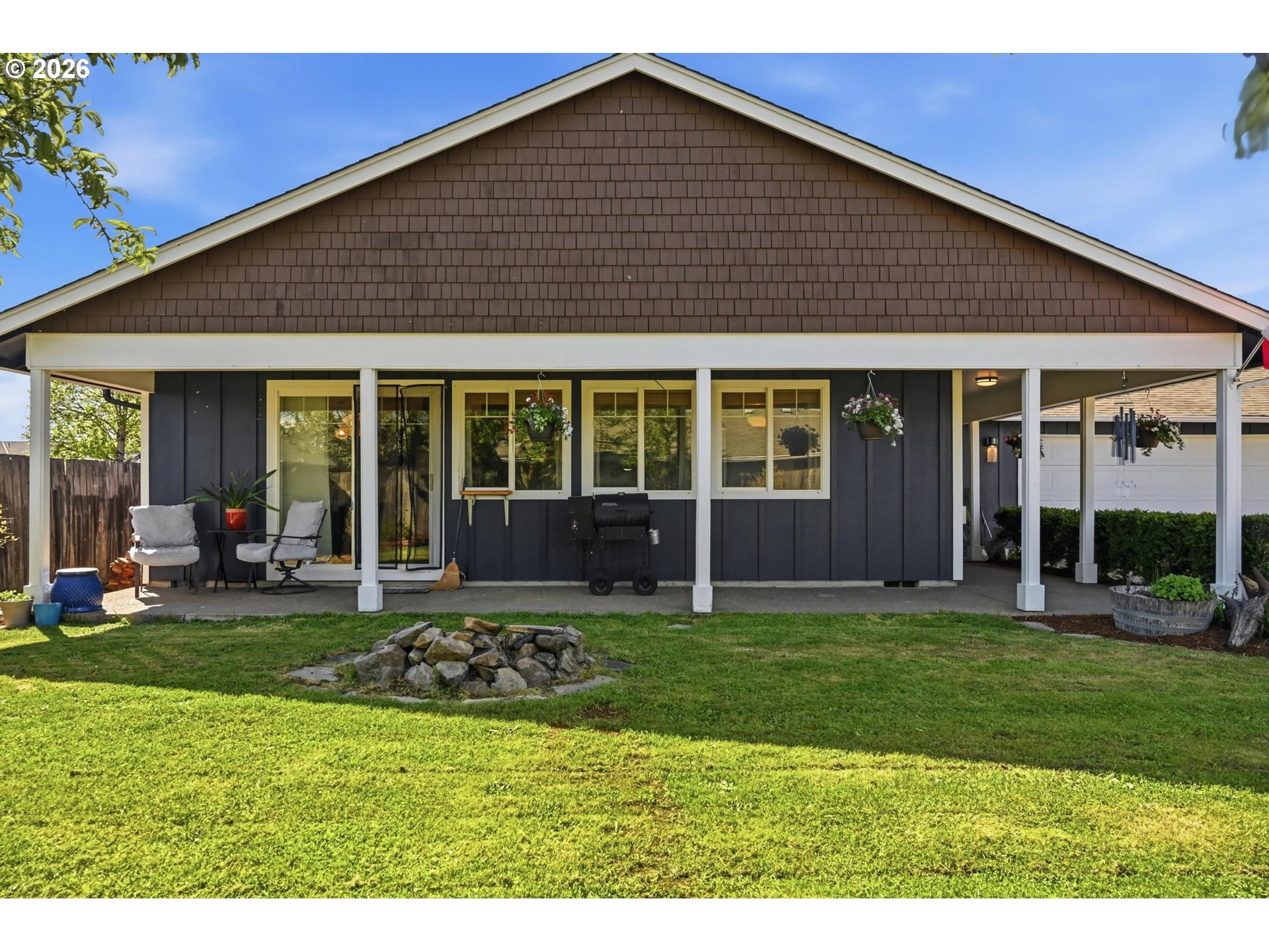624 North Pershing Street Mount Angel, OR 97362 - Photo 41 of 47 a view of a house with backyard and porch