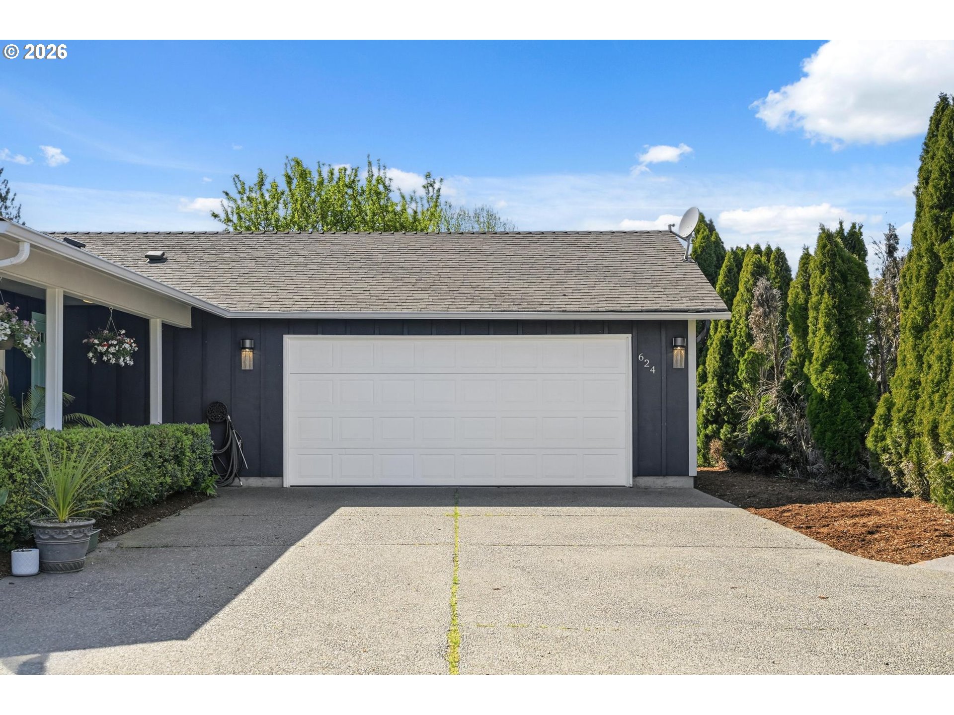 624 North Pershing Street Mount Angel, OR 97362 - Photo 9 of 47 a front view of a house with a yard
