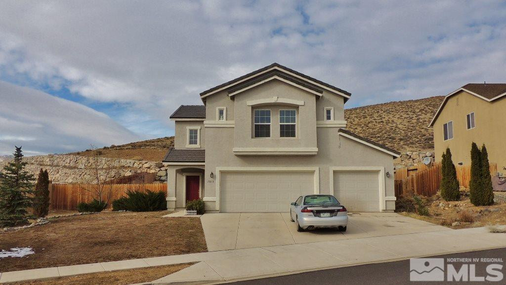 5015 Hitch Road Reno, NV 89506 - Photo 1 of 1 a car parked in front of a house