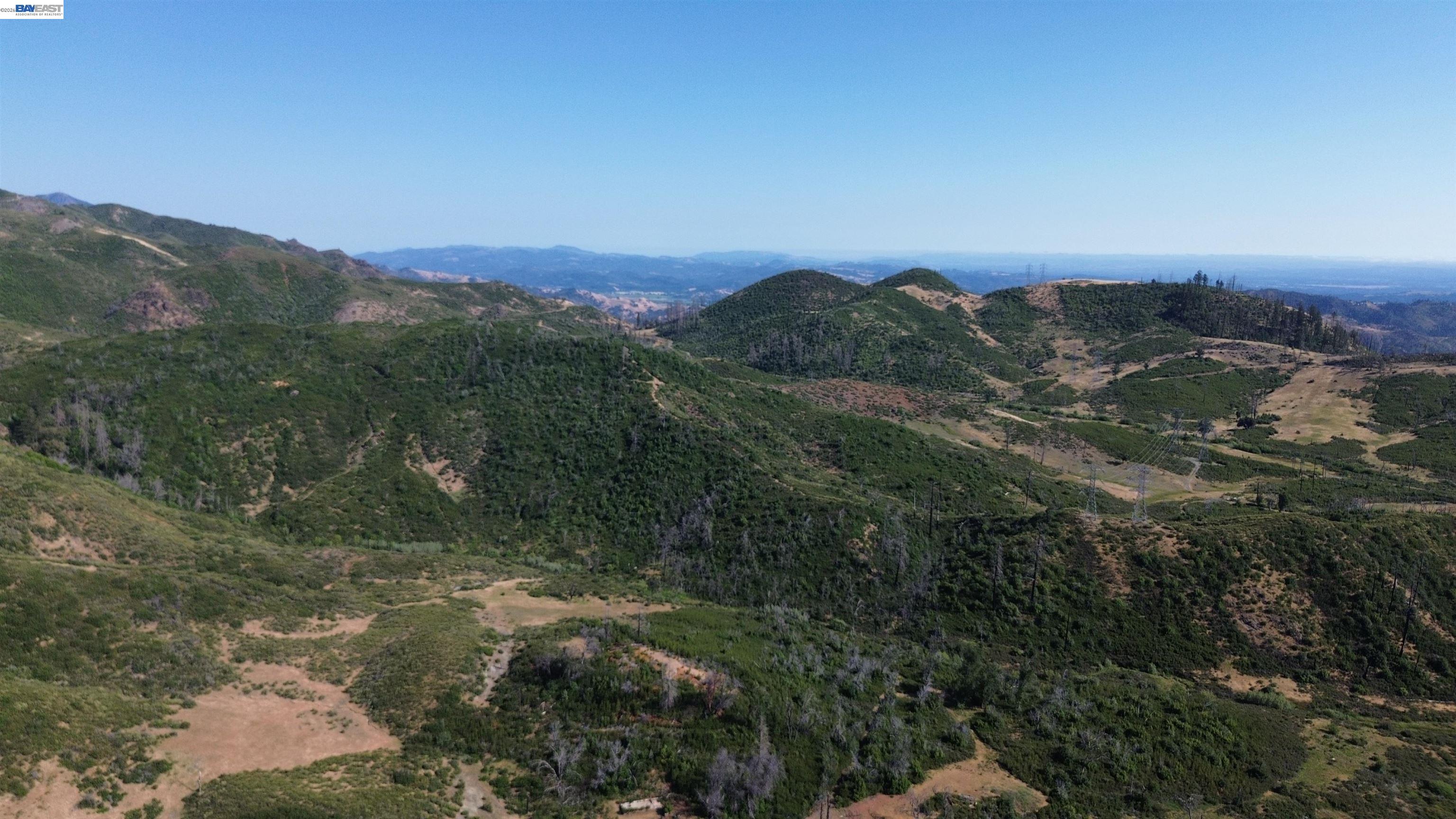 11311 Pine Flat Road Healdsburg, CA 95448 - Photo 3 of 45 a view of a city with lush green forest