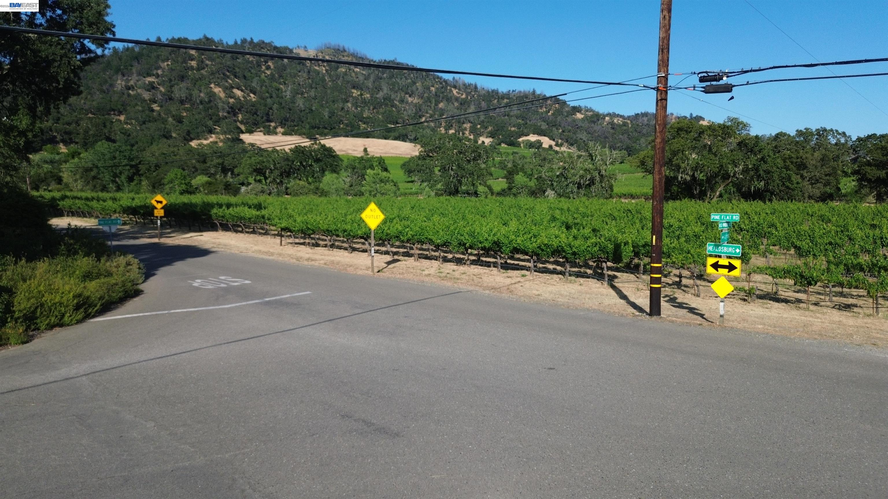 11311 Pine Flat Road Healdsburg, CA 95448 - Photo 40 of 45 a view of a road with a building in the background
