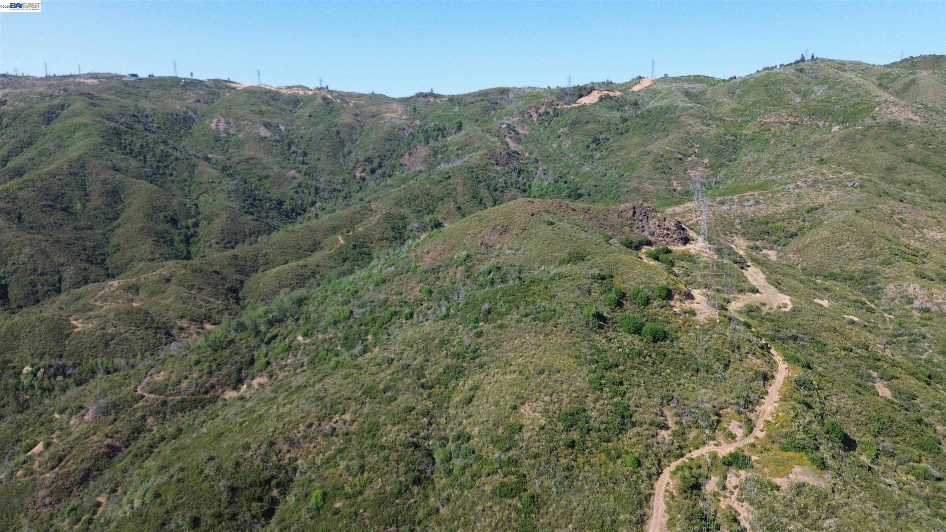 11311 Pine Flat Road Healdsburg, CA 95448 - Photo 6 of 45 a view of a mountain in the distance in a field