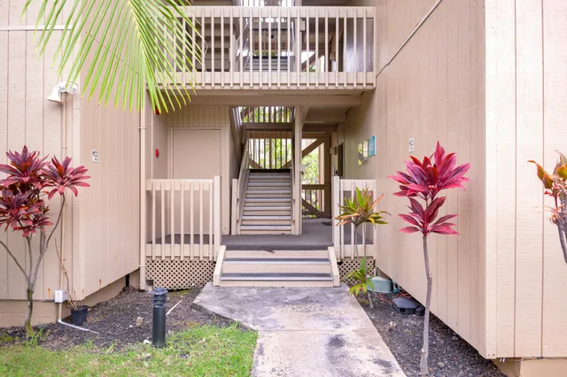 a front view of a house with a porch