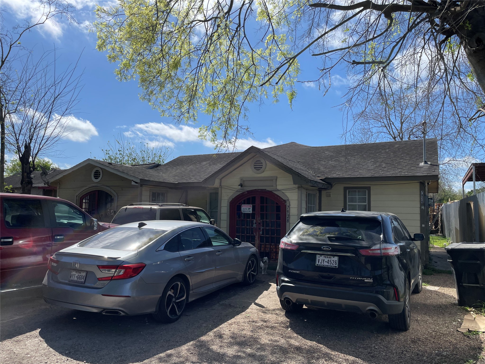 a car parked in front of a house