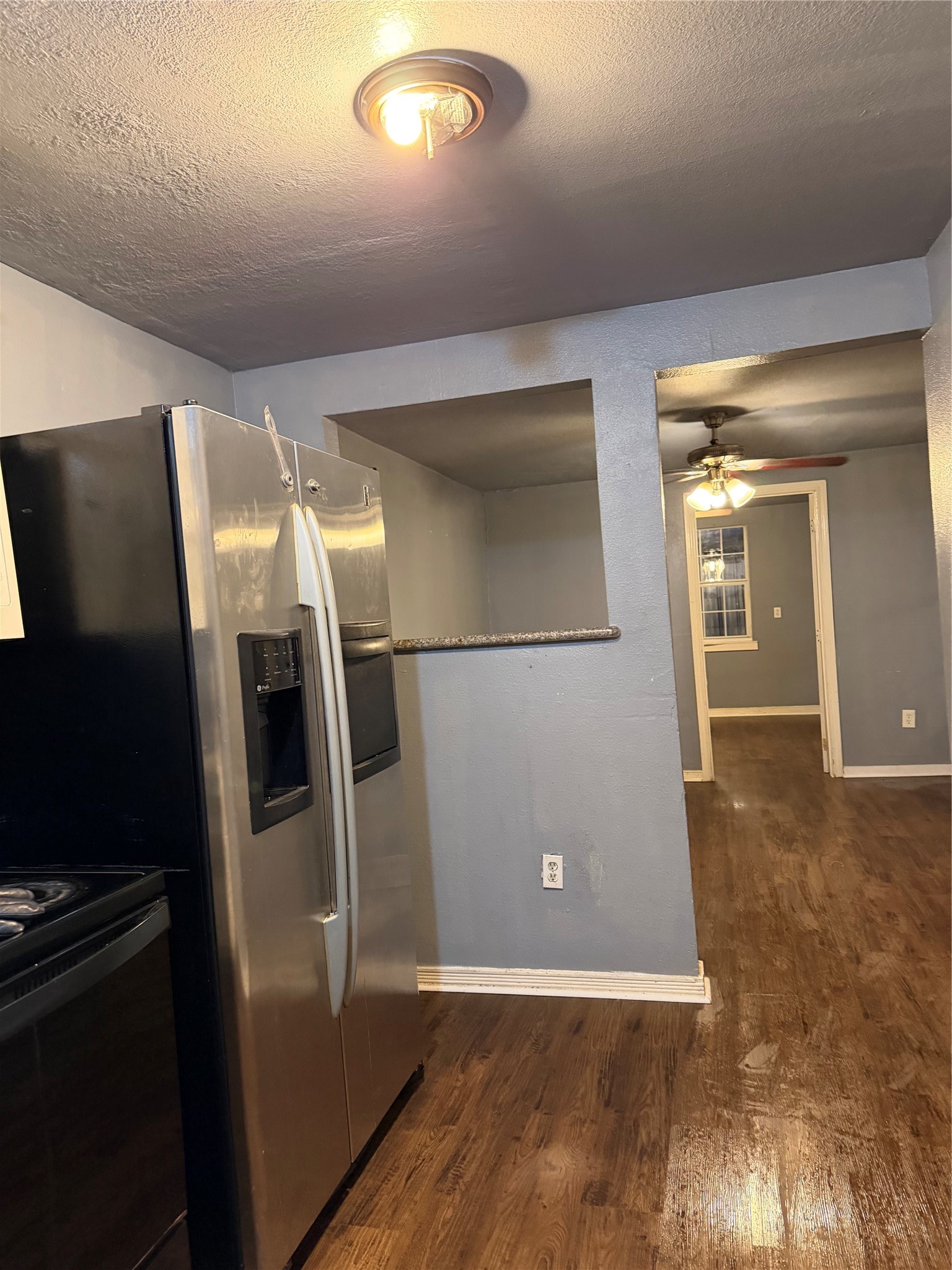 7928 Buchanan Street Houston, TX 77029 - Photo 19 of 25 wooden floor in an empty room