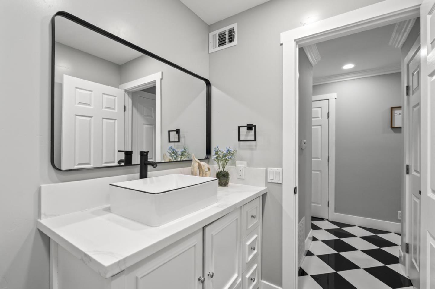 5150 Brookside Lane Concord, CA 94521 - Photo 28 of 54 a bathroom with a sink a toilet a shower and a mirror