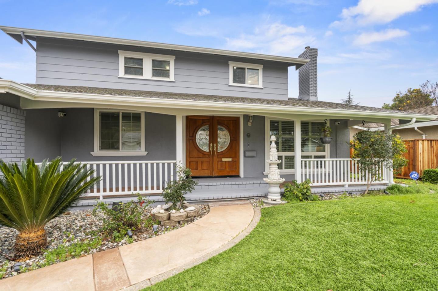 5150 Brookside Lane Concord, CA 94521 - Photo 3 of 54 a front view of a house with a yard