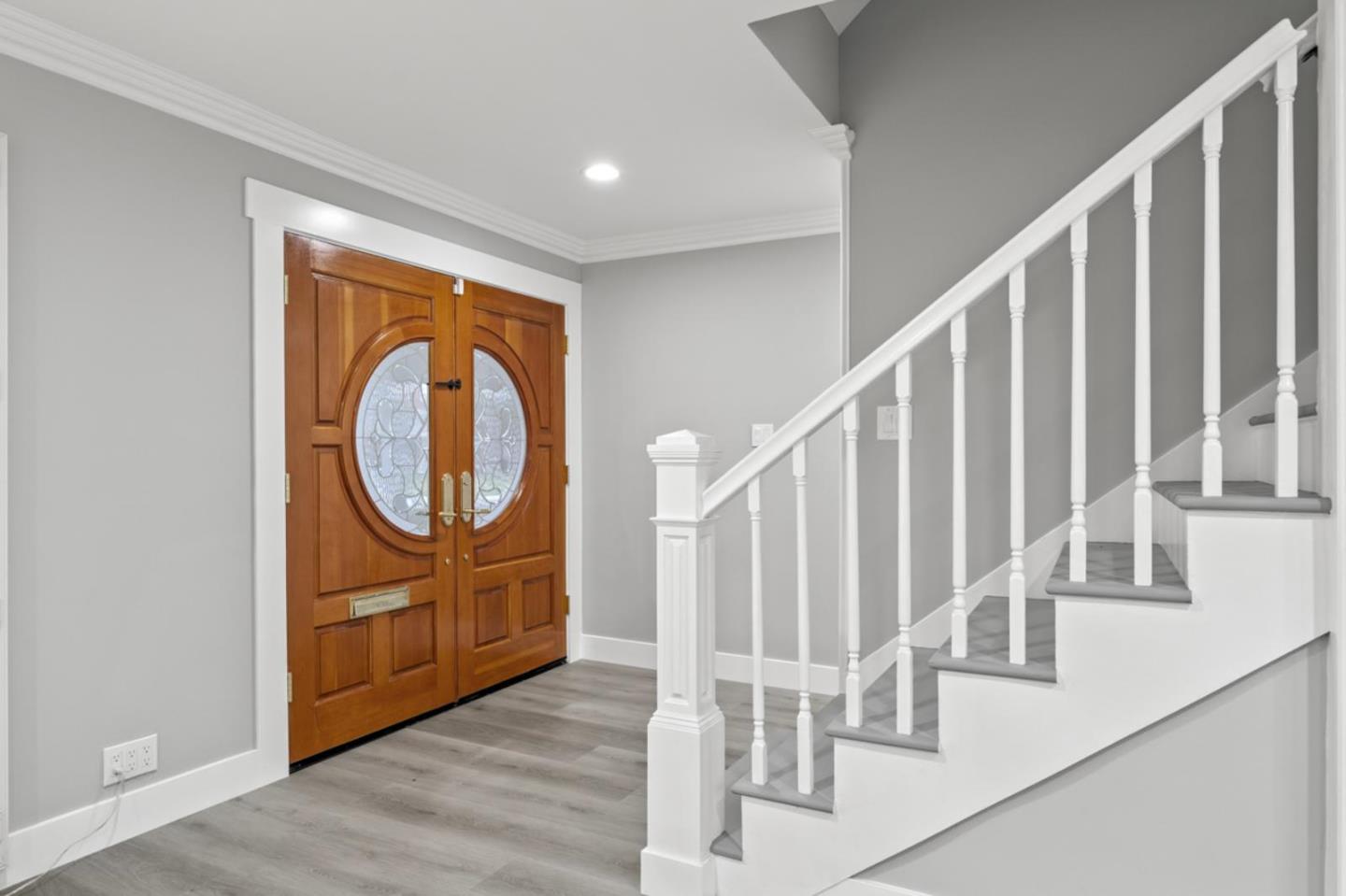 5150 Brookside Lane Concord, CA 94521 - Photo 4 of 54 a view of a hallway with wooden floor and staircase