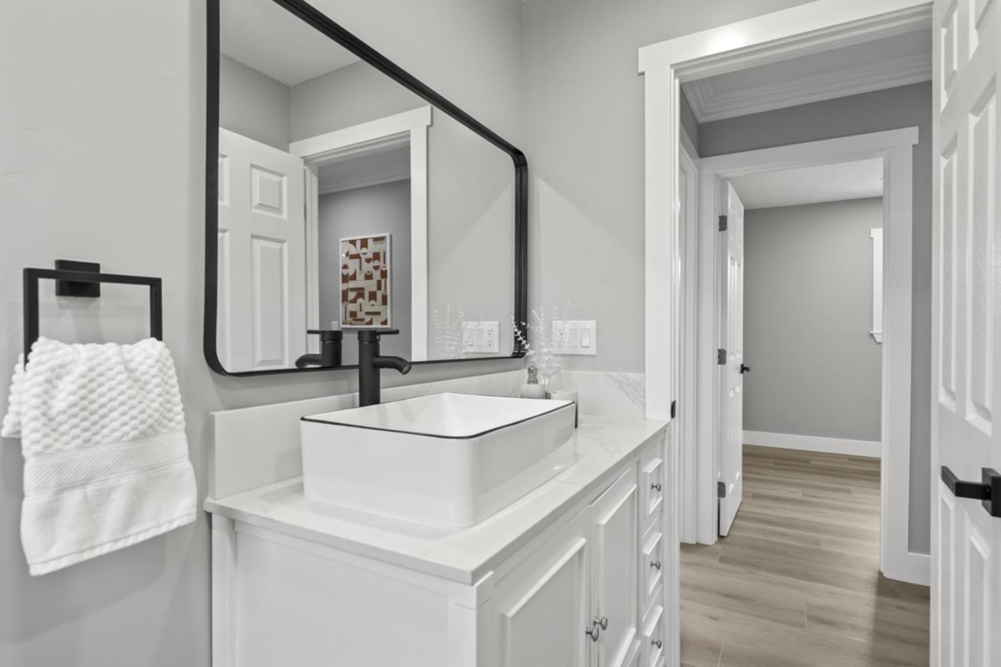 5150 Brookside Lane Concord, CA 94521 - Photo 50 of 54 a bathroom with double vanity sink and a mirror