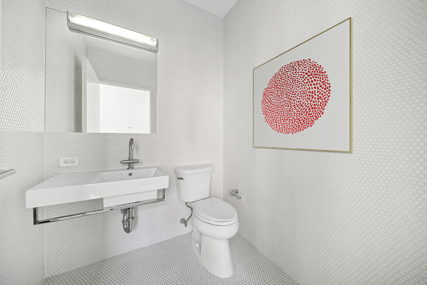 475 Greenwich Street, Unit 3C Manhattan, NY 10013 - Photo 5 of 6 a bathroom with a toilet a sink and a mirror
