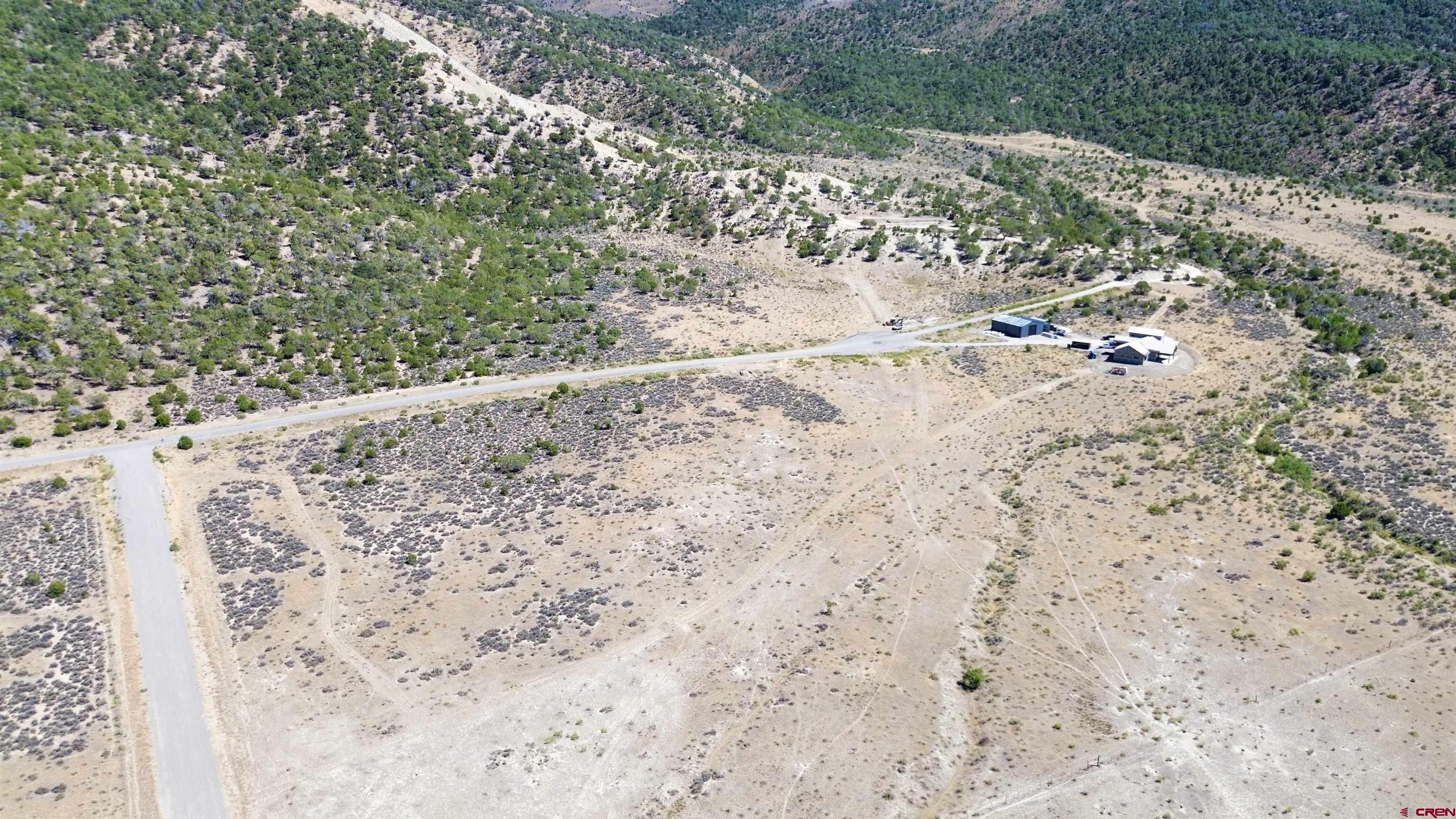 Tbd Lot 27 7250th Road Montrose, CO 81403 - Photo 11 of 15 a view of a dry yard with trees