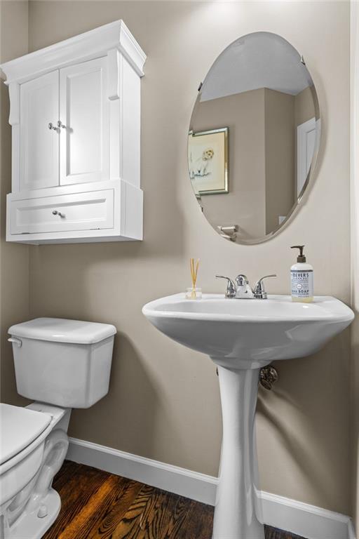 254 Cliffside Drive Mars, PA 16046 - Photo 14 of 25 a bathroom with a toilet a sink and mirror