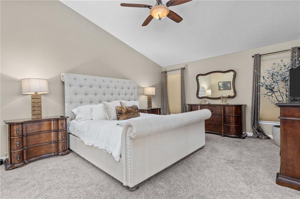 254 Cliffside Drive Mars, PA 16046 - Photo 15 of 25 a bedroom with a bed and a chandelier