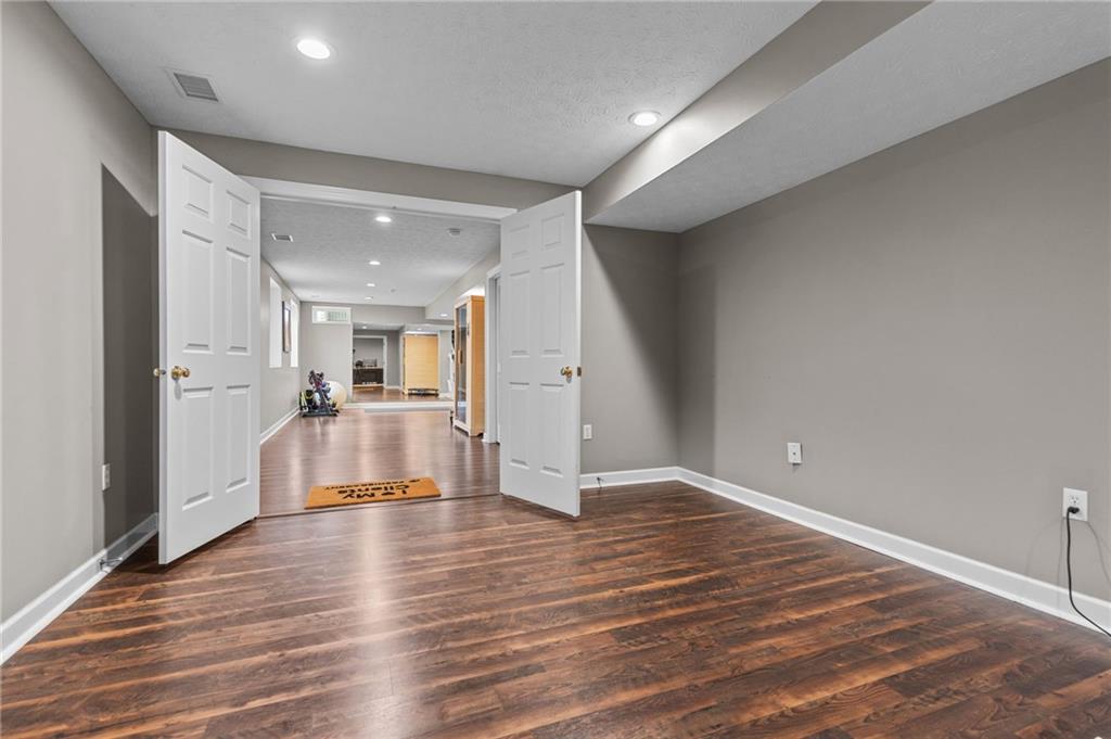 254 Cliffside Drive Mars, PA 16046 - Photo 23 of 25 a view of empty room with wooden floor