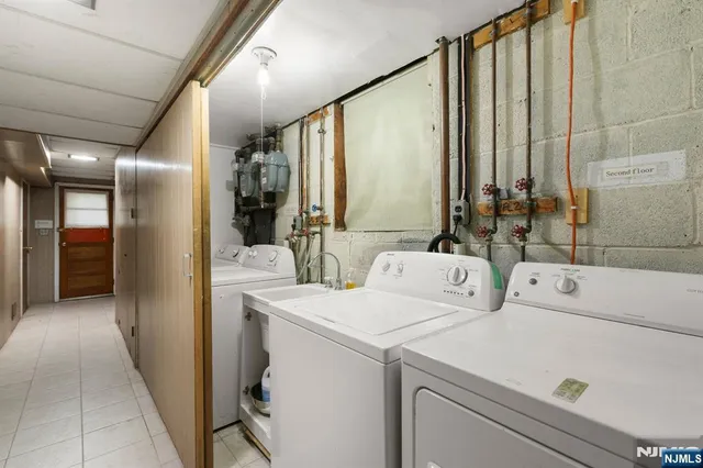 a view of bathroom with dual sinks