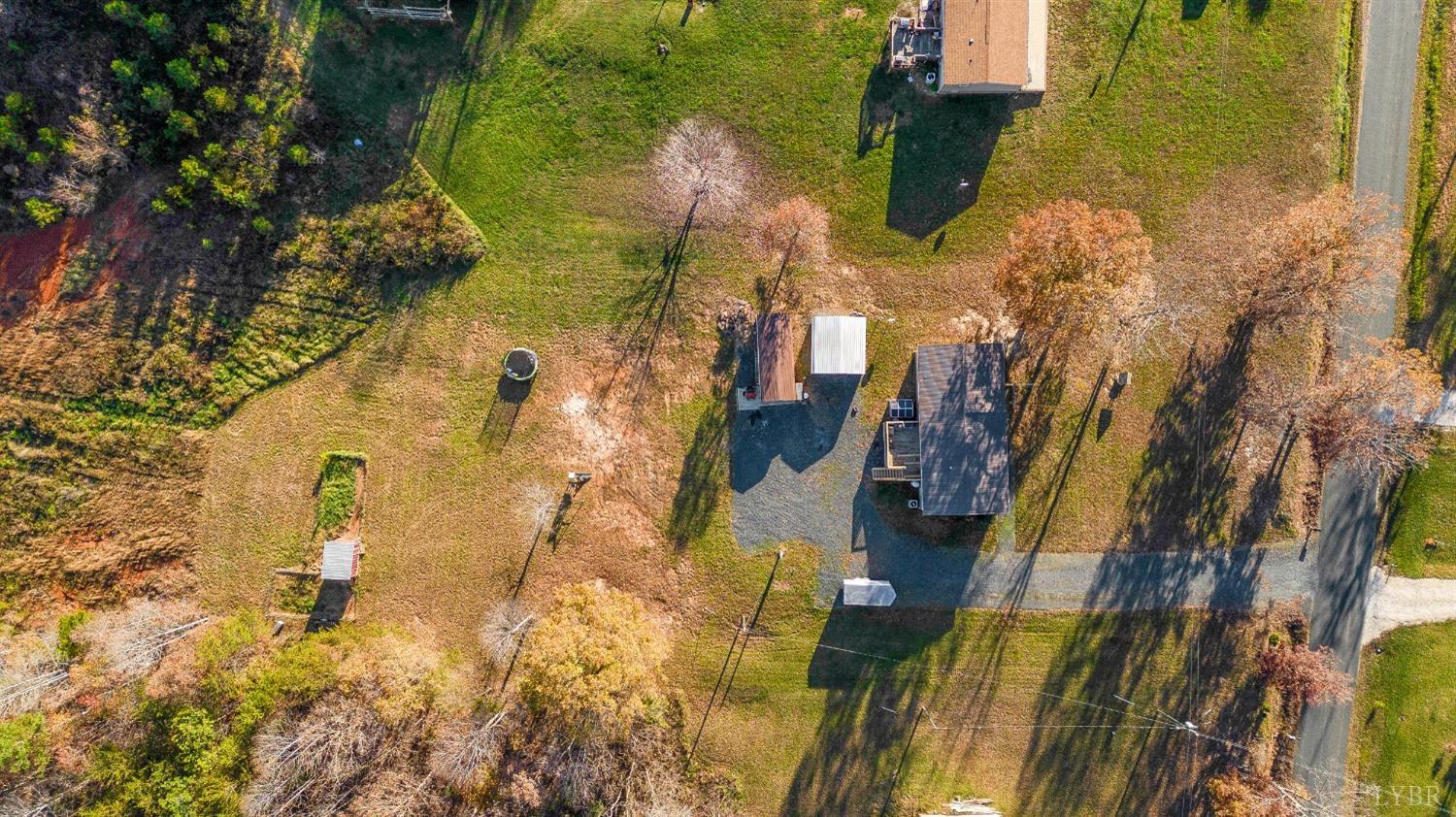 276 Beeks Lane Spout Spring, VA 24593 - Photo 20 of 29 an aerial view of residential houses with outdoor space
