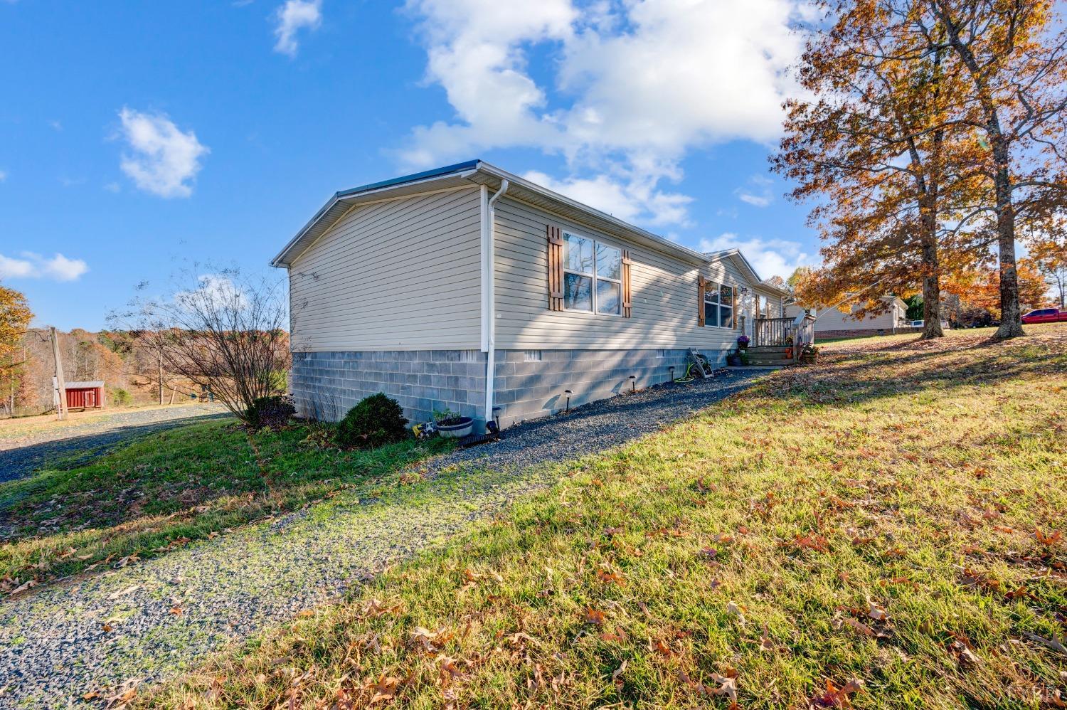 276 Beeks Lane Spout Spring, VA 24593 - Photo 23 of 29 a house view with a garden space