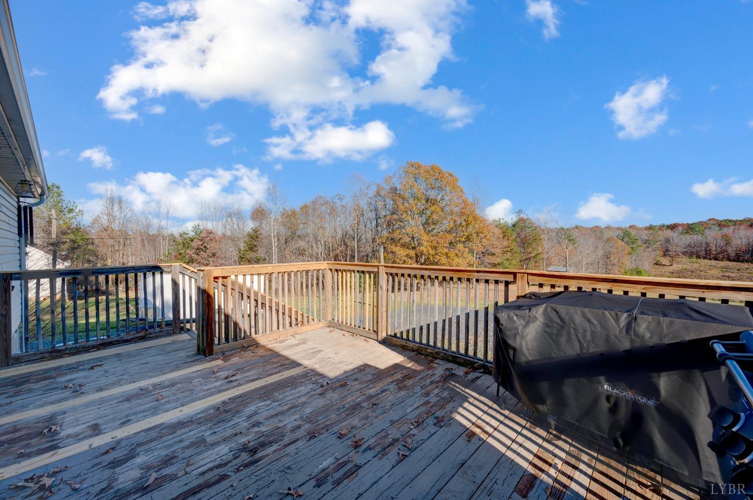 276 Beeks Lane Spout Spring, VA 24593 - Photo 26 of 29 a view of balcony with wooden floor and fence