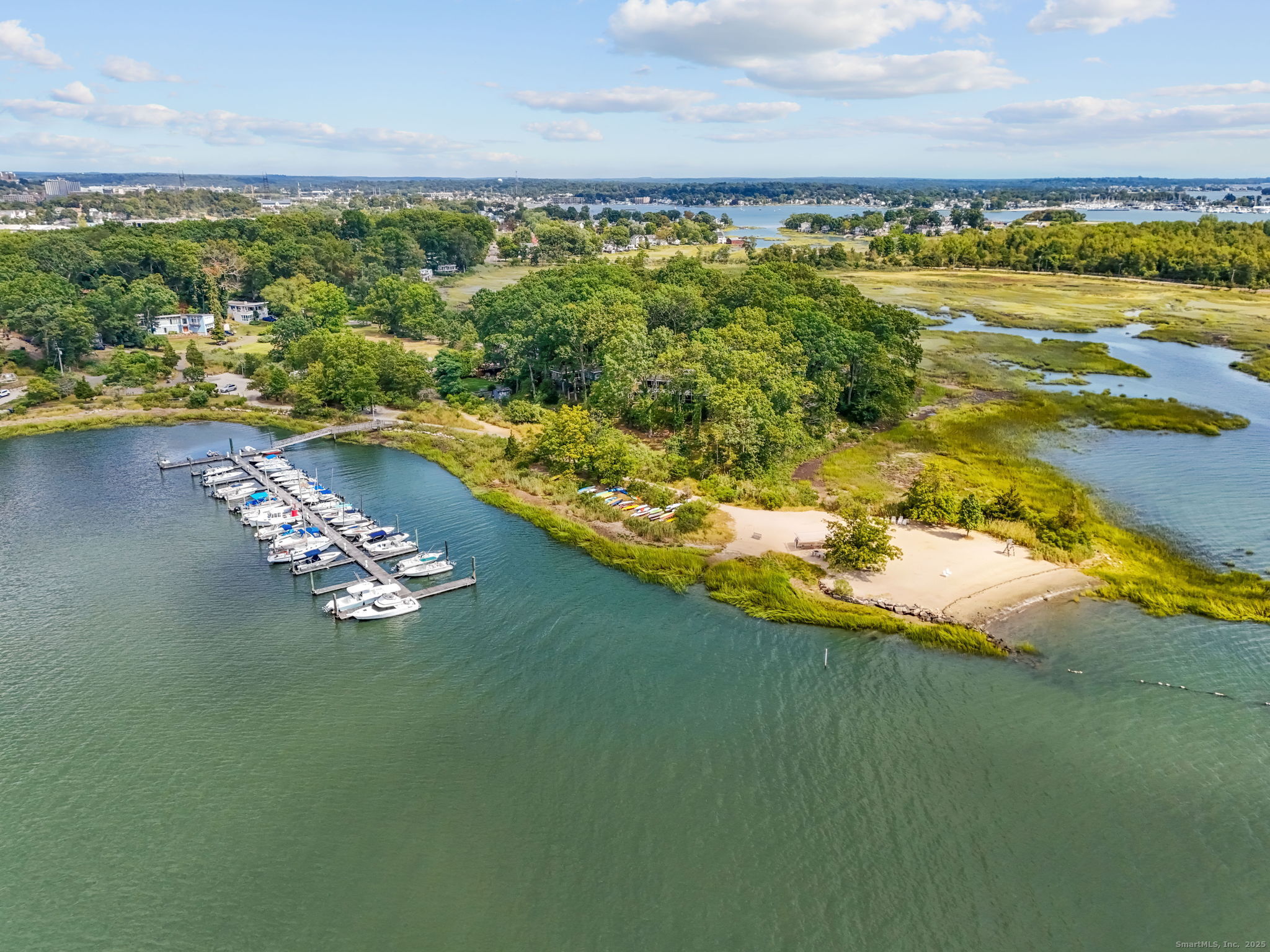 5 Outer Road Norwalk, CT 06854 - Photo 3 of 11 a view of a lake with a nearby beach