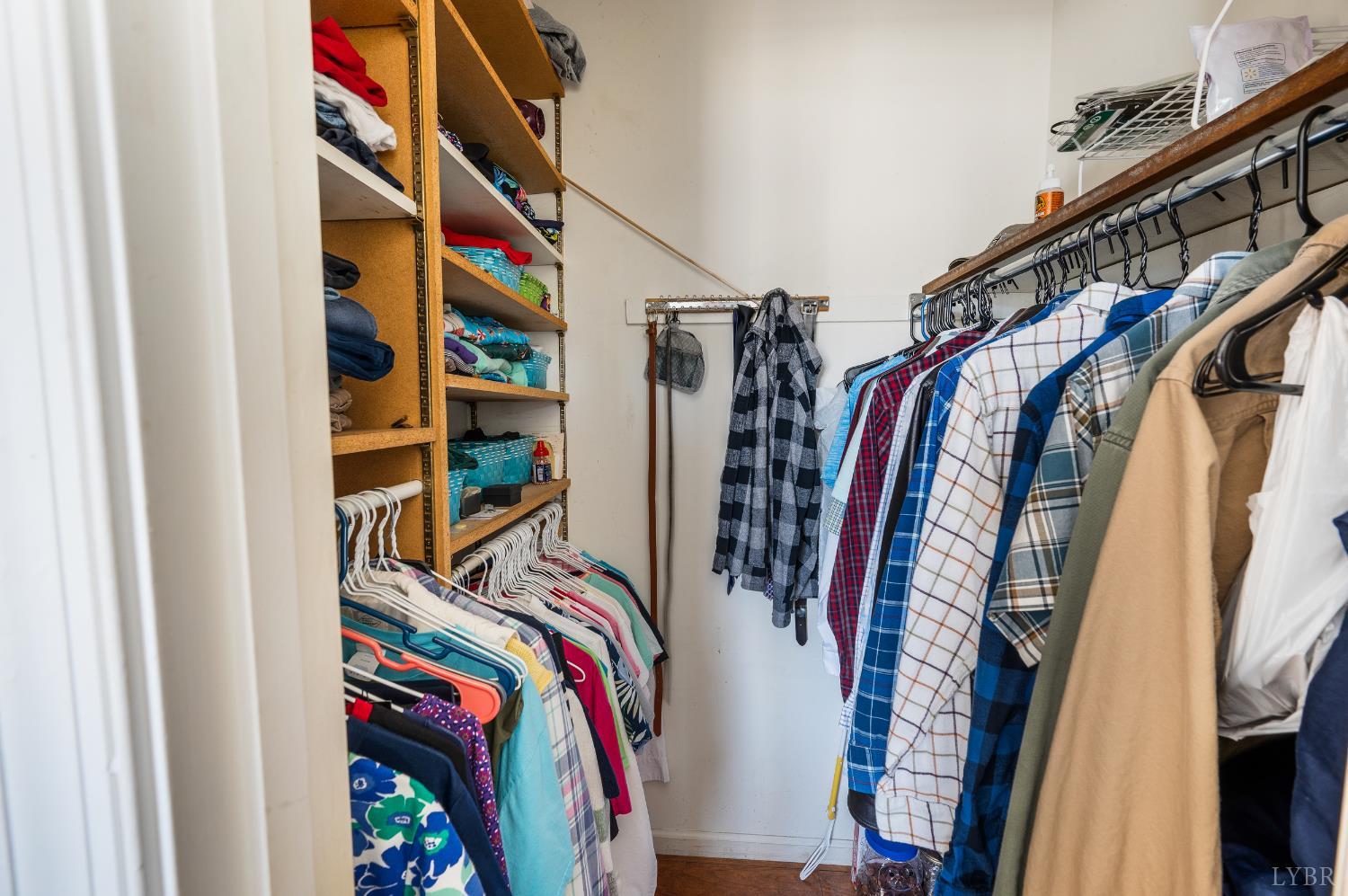 2550 Town Fork Road Evington, VA 24550 - Photo 14 of 42 a view of walk in closet with clothes and shoes