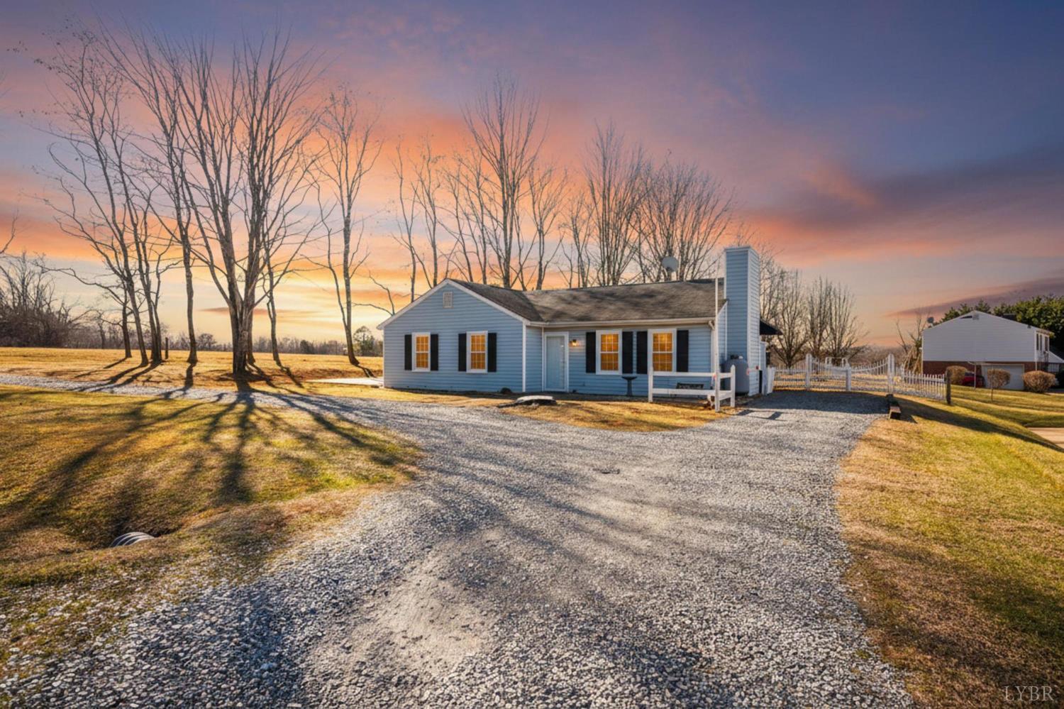 2550 Town Fork Road Evington, VA 24550 - Photo 33 of 42 a view of swimming pool with outdoor seating and house in the background