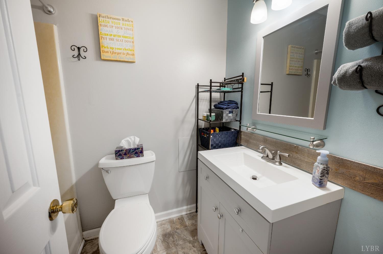 2550 Town Fork Road Evington, VA 24550 - Photo 40 of 42 a bathroom with a toilet sink and mirror