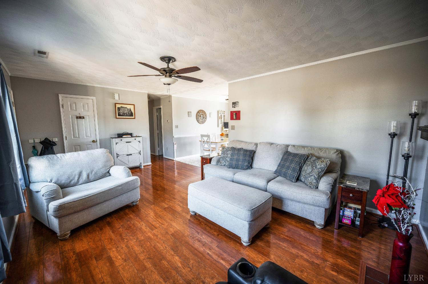 2550 Town Fork Road Evington, VA 24550 - Photo 7 of 42 a living room with furniture and a wooden floor