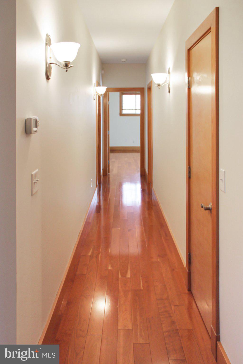 522 Unity Place Buckingham, VA 23921 - Photo 14 of 21 a view of a hallway with wooden floor