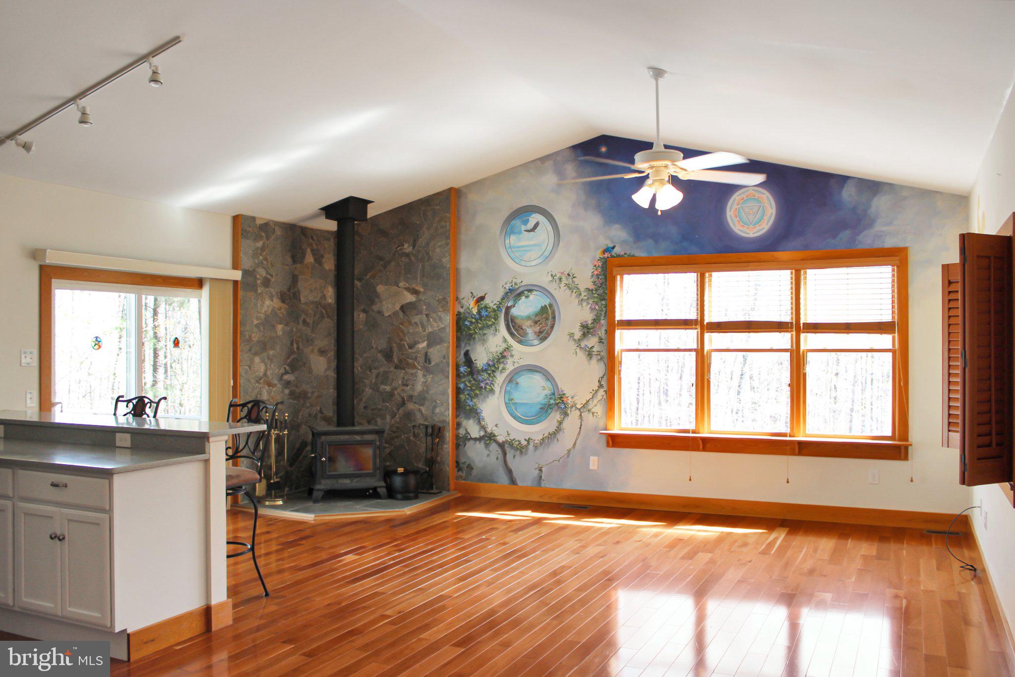 522 Unity Place Buckingham, VA 23921 - Photo 2 of 21 a view of an empty room with a window and wooden floor