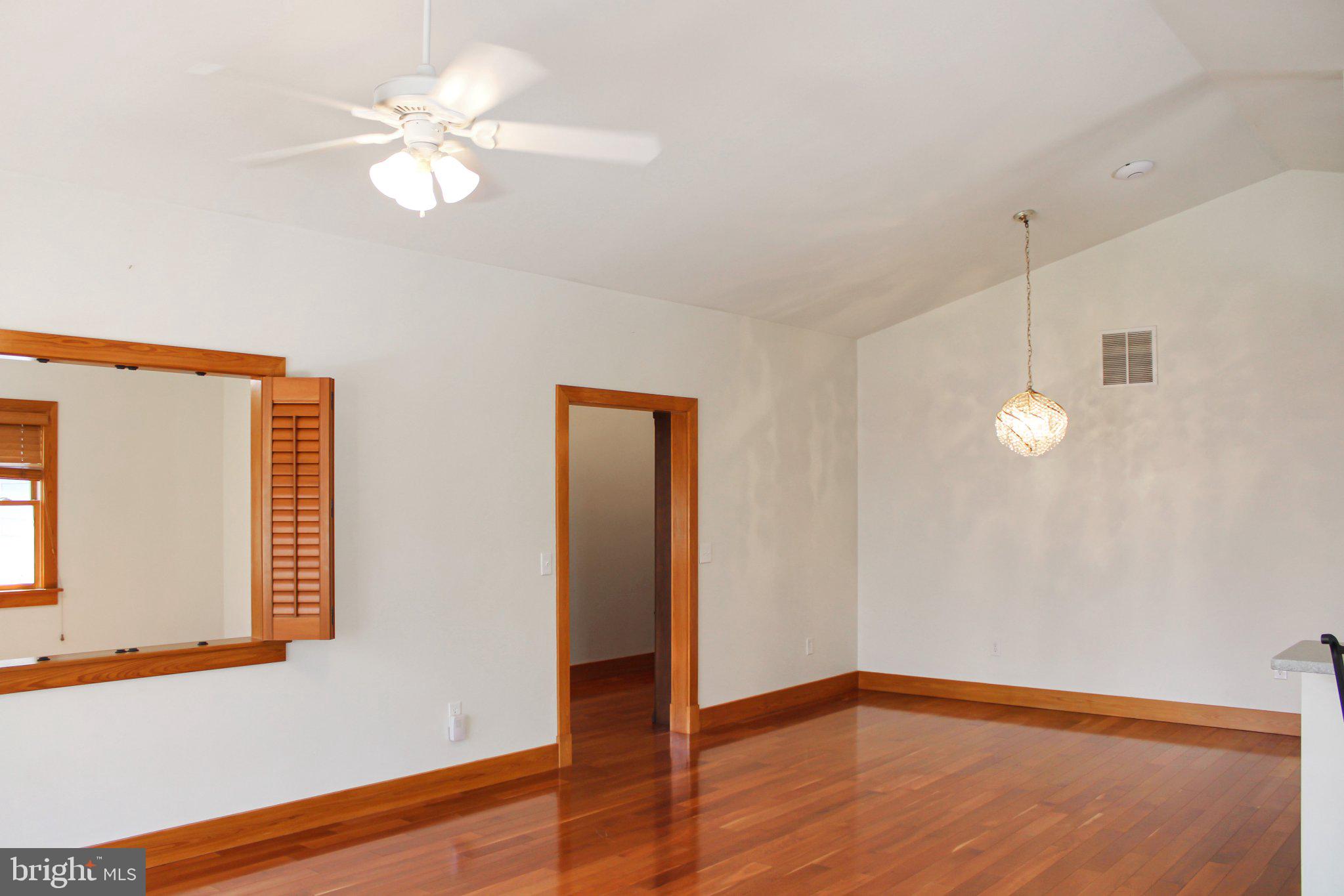 522 Unity Place Buckingham, VA 23921 - Photo 5 of 21 an empty room with wooden floor and window