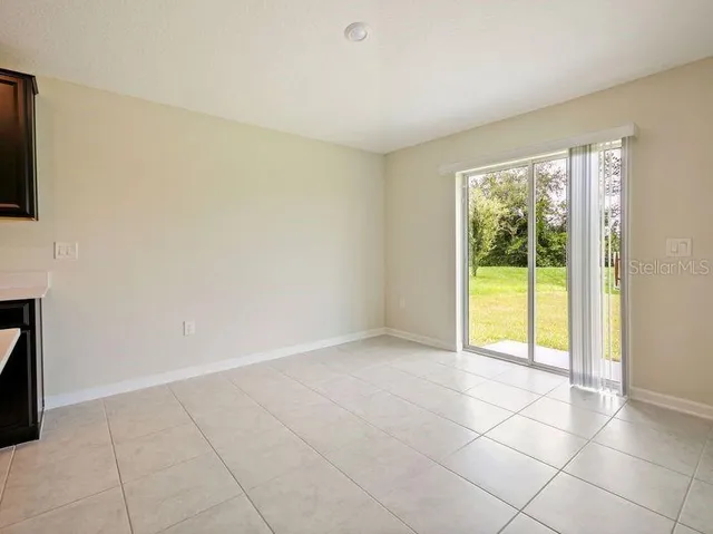 an empty room with an entryway