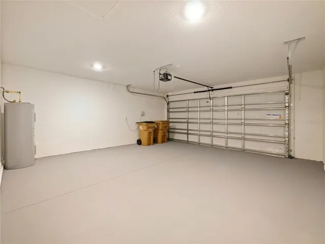 a work room with furniture and a bookshelf