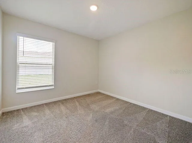 an empty room with a window