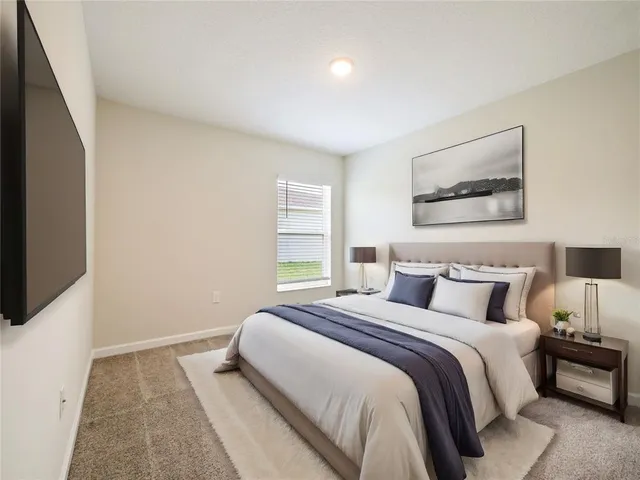 a view of a golf course with a lake