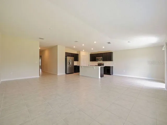 a view of a kitchen with a sink
