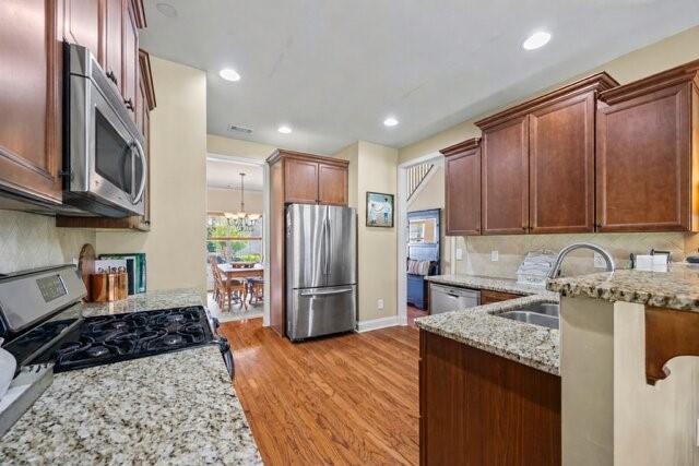 42 Pintail Lane Jefferson, GA 30549 - Photo 7 of 42 a kitchen with stainless steel appliances granite countertop a refrigerator sink and cabinets