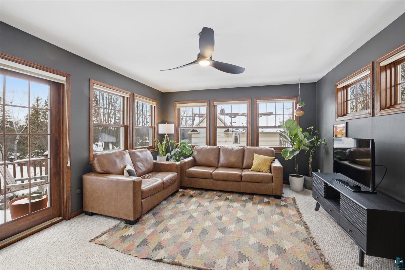 2201 Vermilion Road Duluth, MN 55803 - Photo 21 of 79 Living area with a ceiling fan and light carpet