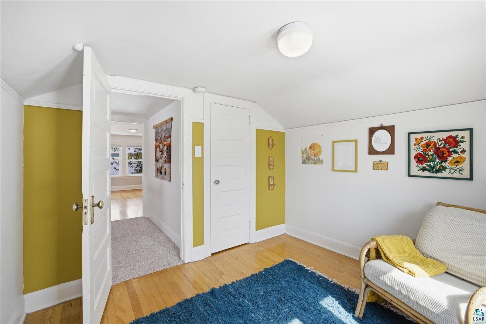 2201 Vermilion Road Duluth, MN 55803 - Photo 34 of 79 Sitting room featuring light wood finished floors and vaulted ceiling