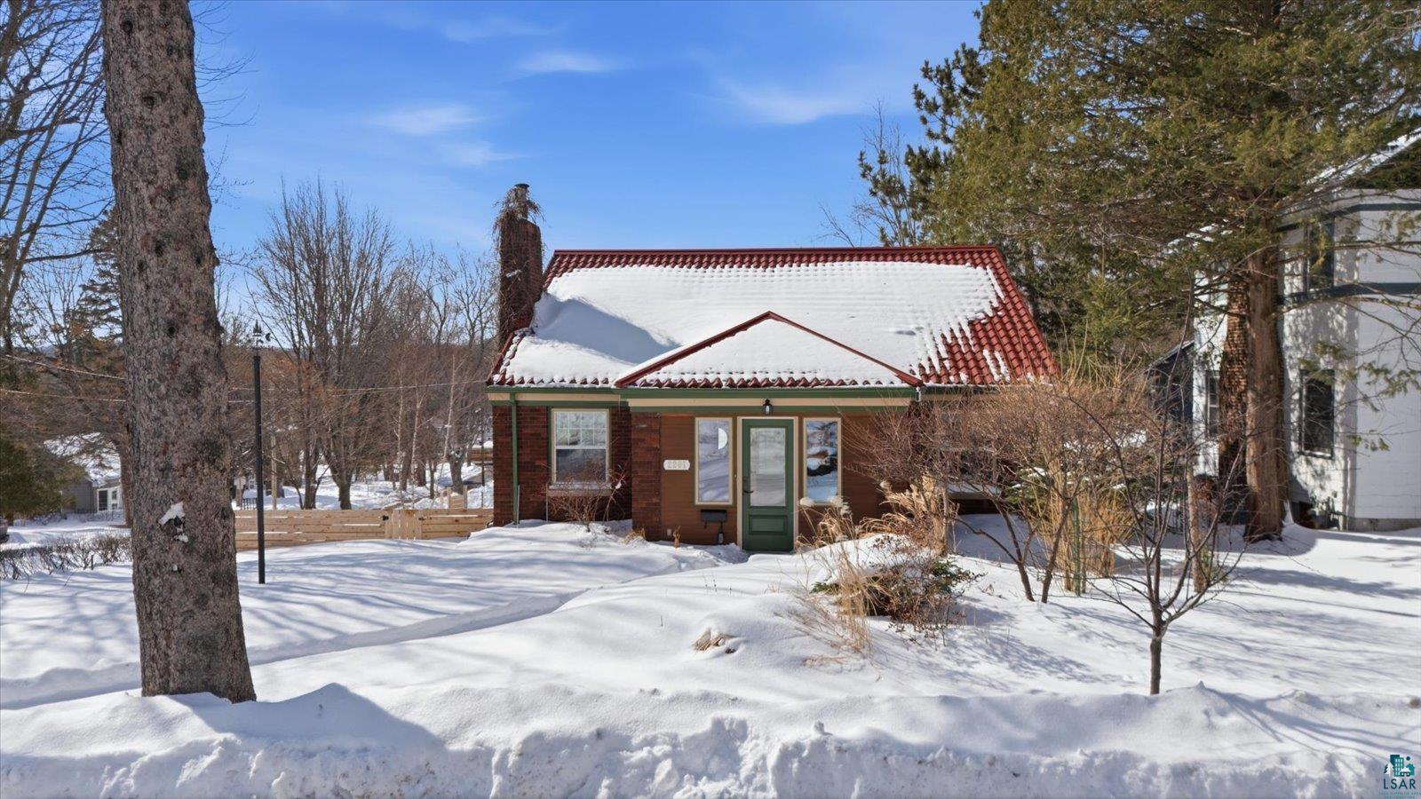 2201 Vermilion Road Duluth, MN 55803 - Photo 65 of 79 View of front of house featuring a chimney