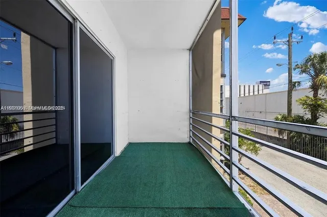 a view of balcony with two chairs