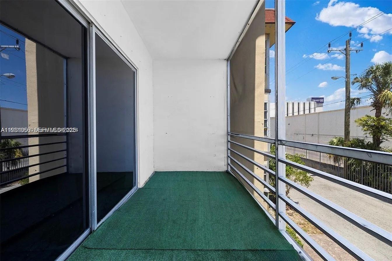 4043 Northwest 16th Street, Unit 201 Lauderhill, FL 33313 - Photo 21 of 22 a view of balcony with two chairs