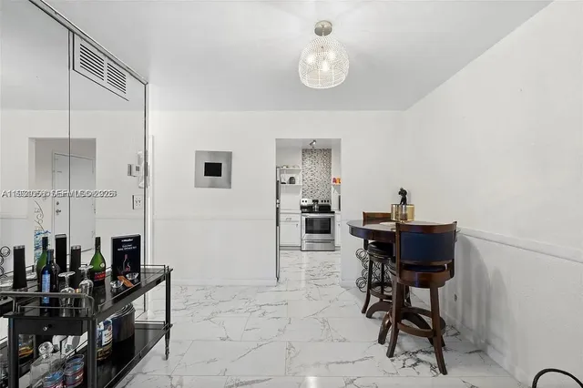 a view of a dining room with furniture