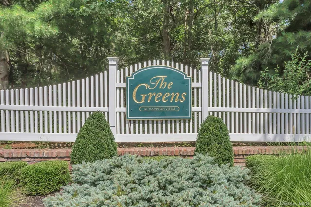 a view of a wooden fence