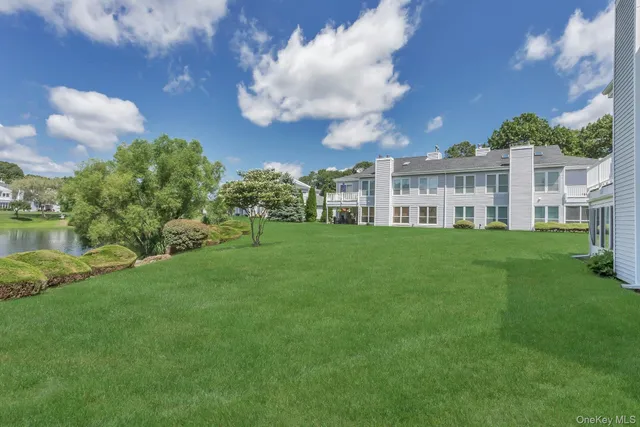 a view of a house with a big yard