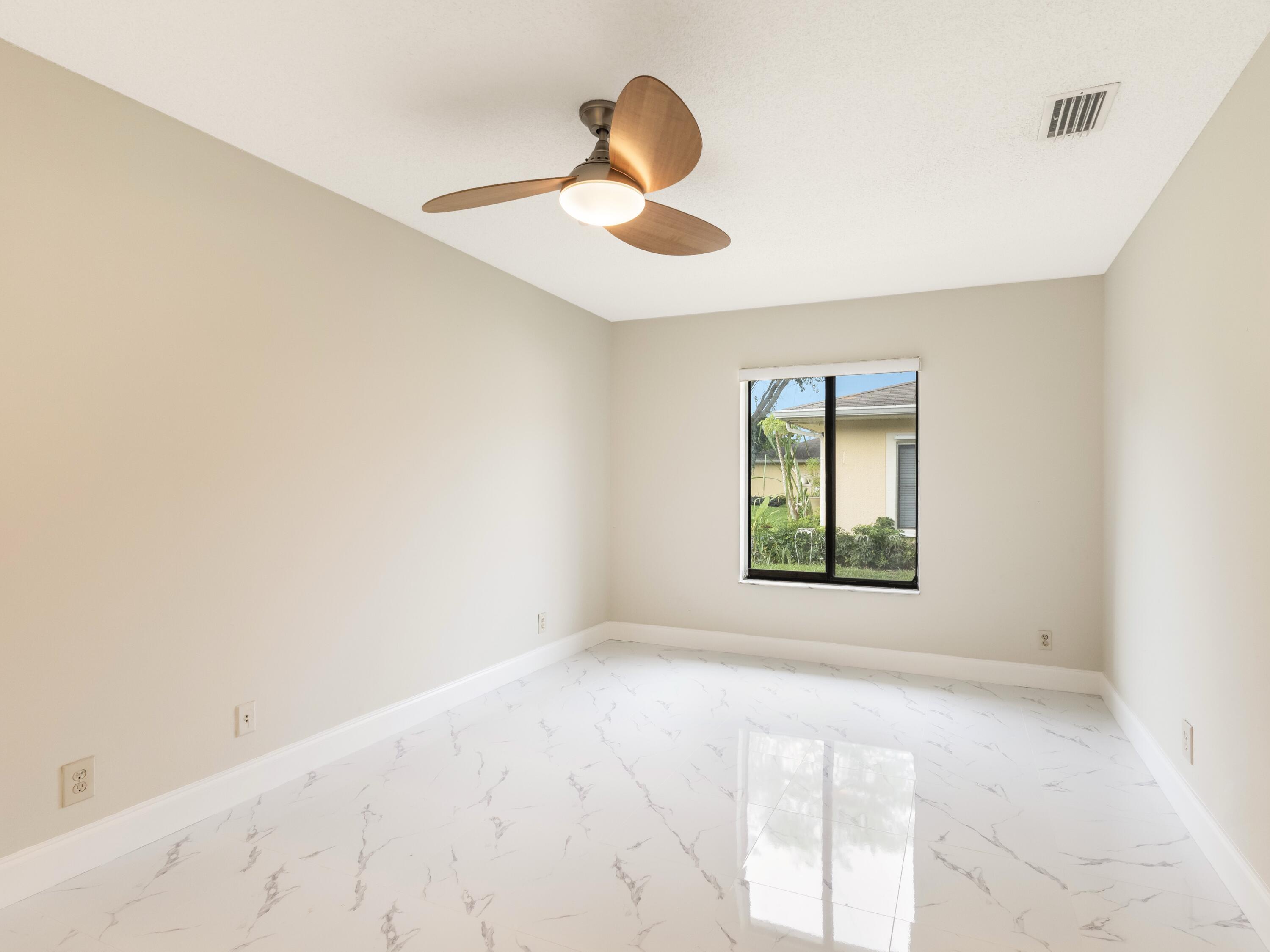 4806 Cherry Road West Palm Beach, FL 33417 - Photo 23 of 28 Primary Bedroom